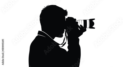 Silhouette of a photographer taking a picture isolated on white background