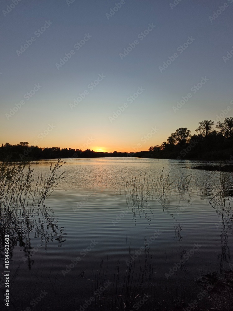Fototapeta premium sunset over the river
