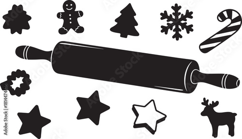 Christmas baking with rolling pin and cookie cutters in black silhouette