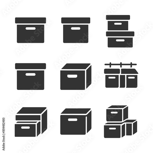 Set of dark storage box icons in various minimalist designs.