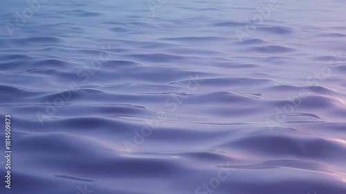 Serene purple water surface with gentle waves and subtle light reflections