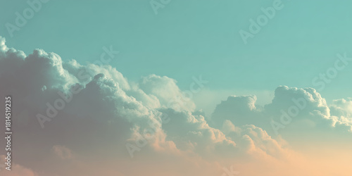 Fototapeta Naklejka Na Ścianę i Meble -  Dreamy pastel sky with soft clouds in warm orange and turquoise gradient, calm and inspiring minimal landscape background
