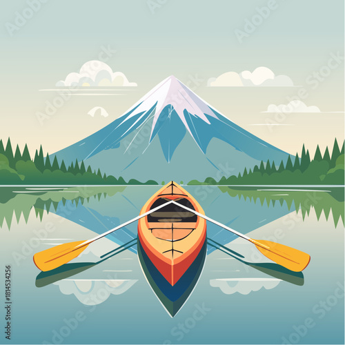 Canoe on calm lake with snowy mountain backdrop
