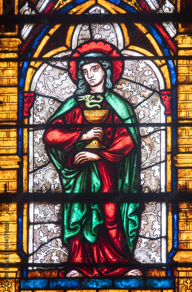 Obraz premium Stained glass (19th century) of Saint John the evangelist. Saint of the Roman Catholic Church.