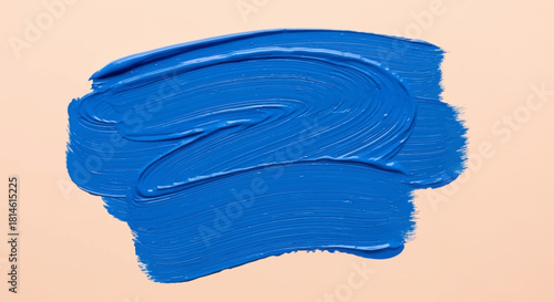 Bold blue paint stroke against a neutral backdrop offers a modern artistic flair and vibrant color pop