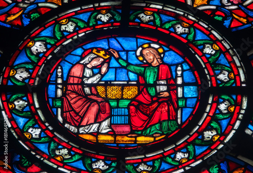 Stained glass (19th century) of Coronation of the Virgin Mary, Mother of God, in heaven.