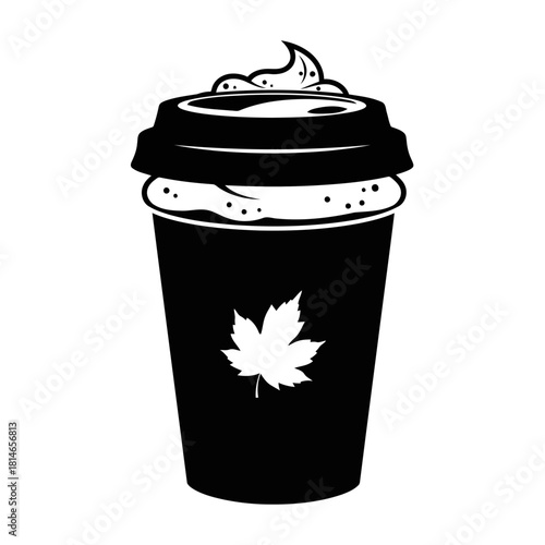 Black coffee cup with whipped cream and maple leaf design on isolated