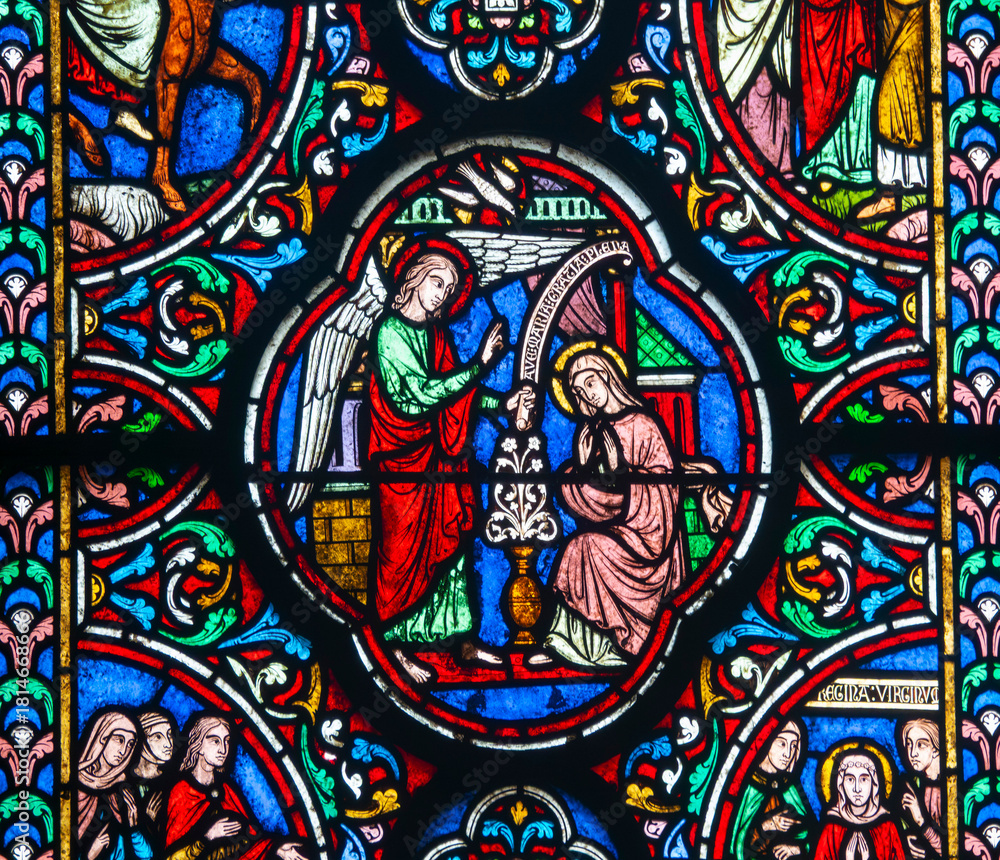 Naklejka premium Stained glass (19th century) of Annunciation to the Blessed Virgin Mary by the Archangel Gabriel.