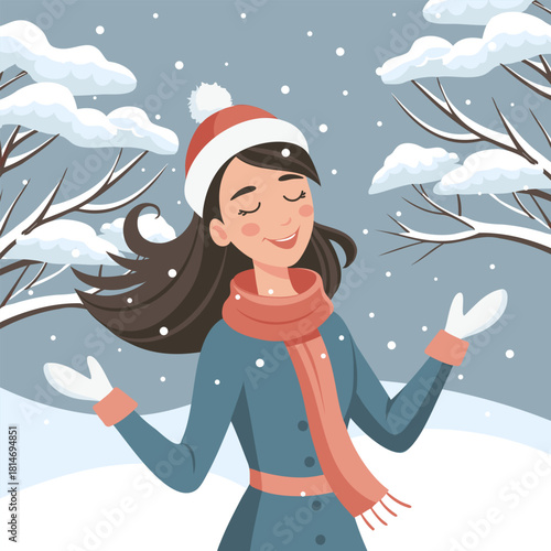 Joyful woman enjoying winter snowfall. Holiday background.