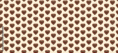 Seamless pattern of vibrant beaded heart ornaments arranged in a repeating design on a soft beige background, perfect for festive or decorative uses.