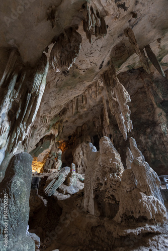 Inside the tall and scenic Khao Khanampnam (Khanap/Khanab Nam) Cave with a tall stalagmites and stalactites in Krabi Town, Thailand.