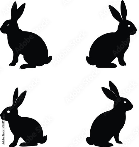 Solid black silhouette of a rabbit sitting with long ears, simple minimal vector clip art, isolated on transparent background. Cute animal symbol.
