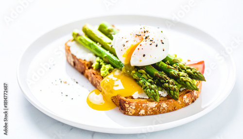 Breakfast of toast, poached eggs, and asparagus AI