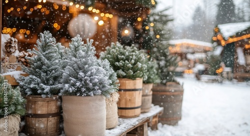 Snowy Winter Scene With Decorated Trees and Warm Lights Creating a Festive At...