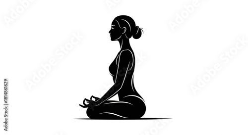 Silhouette of a Woman Meditating in a Serene Yoga Pose.