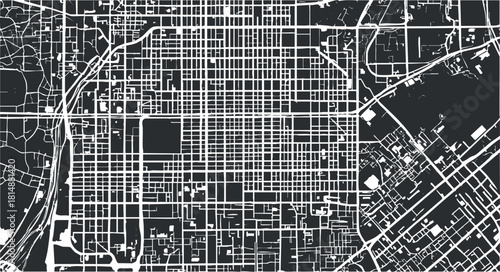 Black and white city street map with grid layout and intricate road network design.