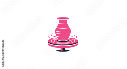 Pottery wheel shaping a vase