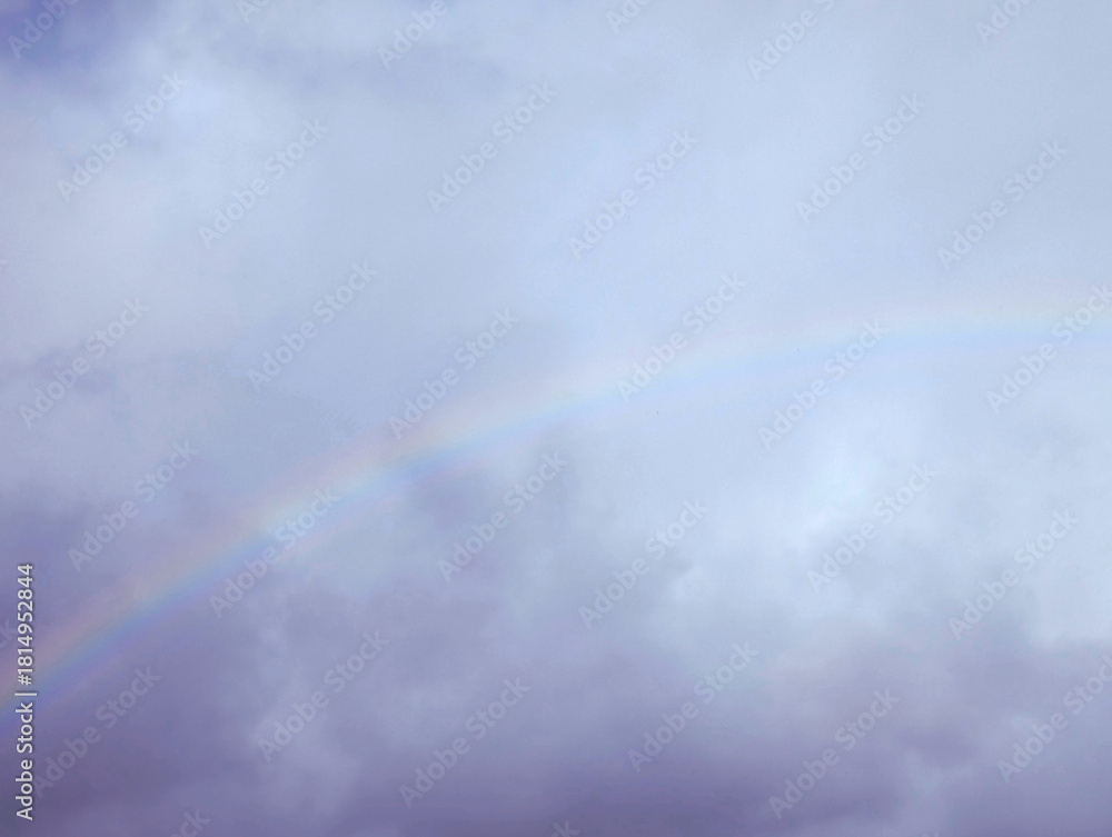 Obraz premium Rainbow on a dark blue sky background