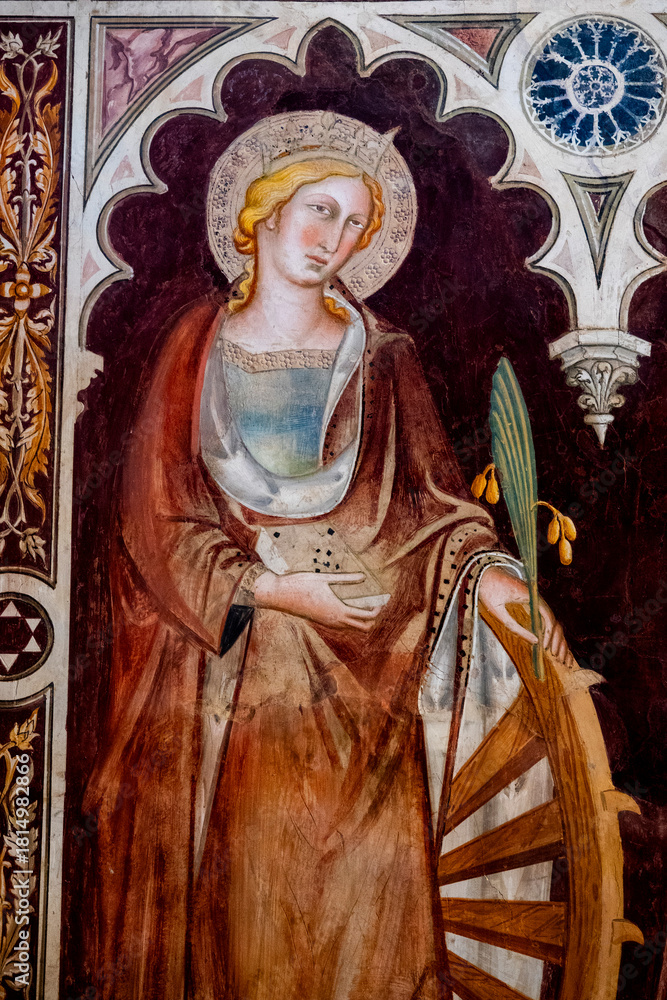 Obraz premium Fresco (14th century) of Saint Catherine of Alexandria. Saint of the Roman Catholic Church.