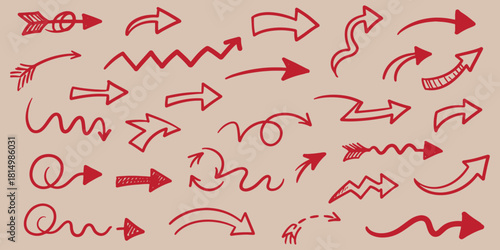 A collection of various red hand drawn arrows pointing in different directions on beige paper