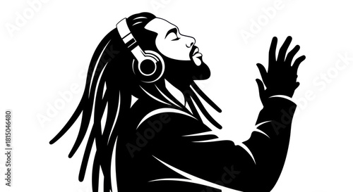 Man with dreadlocks wearing headphones listening to music with raised hand.