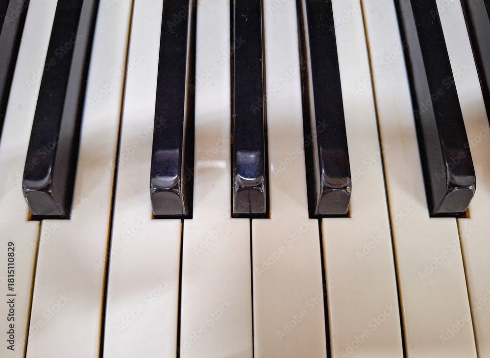 Naklejka premium piano keys close up