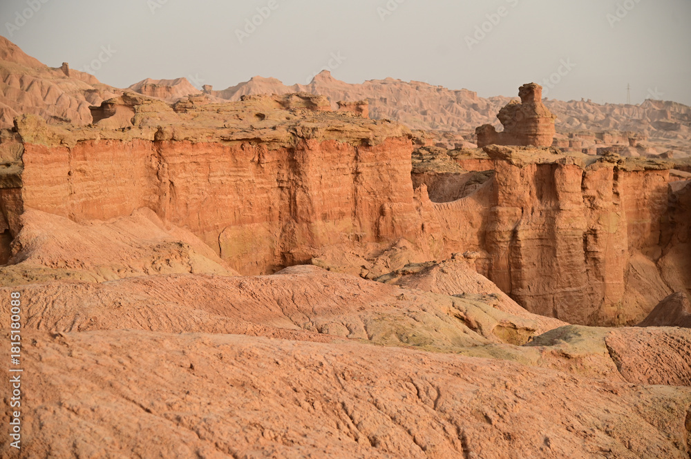 Fototapeta premium Kizil Red Stone Forest Scenic Area in Xinjiang , China is the strangely shaped red rock forests were carved by wind and sand over millions of years.The rocks are red in color due to the iron content.