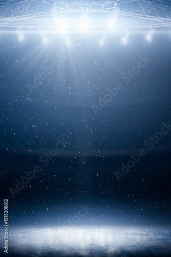 Blue background. Vertical. Stage ice podium with blue spotlights, smoke, and glitter on a dark background. Theatrical performance and awards ceremony concept. Sports backdrop