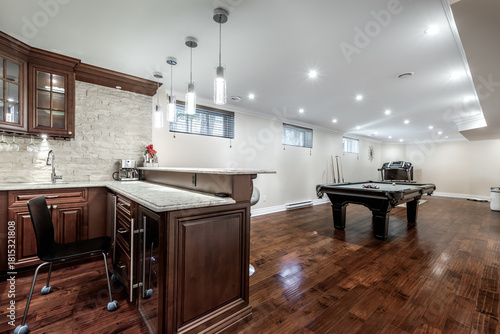 Exterior and interior of a modern Canad house with backyard, driveway, and complete living spaces. Includes living room, kitchen, bedrooms, bathrooms, hallways and basement