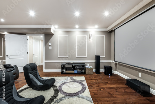 Exterior and interior of a modern Canad house with backyard, driveway, and complete living spaces. Includes living room, kitchen, bedrooms, bathrooms, hallways and basement