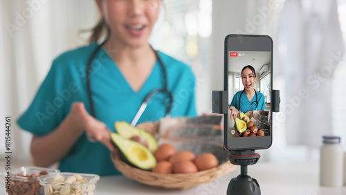 Asia woman people anti aging expert modern health care vlogger live advice talk selfie video mobile phone camera. Online diet food weight loss HDL meal plan recipe digital virtual asian coach filming.