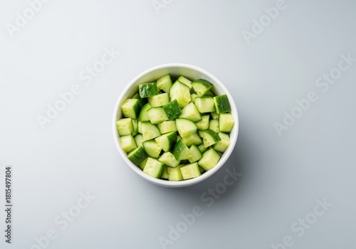 Wallpaper Mural Vibrant green diced cucumber chunks in a clean white bowl, healthy ingredient Torontodigital.ca