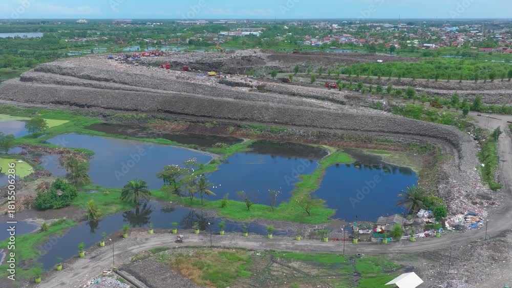 custom made wallpaper toronto digital Aerial footage of a landfill in Medan, showcasing heavy machinery managing and organizing waste efficiently