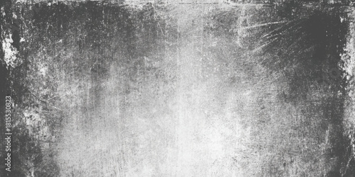 Dark grunge metal texture with scratches and gradient light old distressed concrete wall background banner.