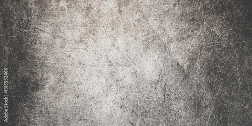Dark grunge concrete wall texture with cracks stains and rough surface abstract distressed background overlays, urban designs.