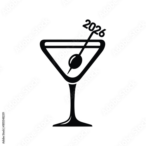 Martini glass with olive and 2026 toothpick new year celebration cocktail party