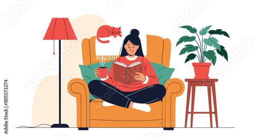 Cozy scene of a young woman relaxing in a comfortable armchair, reading a book and drinking a hot beverage with her cat sleeping nearby.