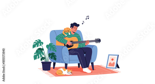 A relaxed young man sits in a comfortable armchair at home, playing an acoustic guitar with two cute cats resting peacefully beside him.