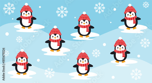 Adorable winter seamless pattern of cute penguins wearing red hats and scarves standing in the snow with falling snowflakes.