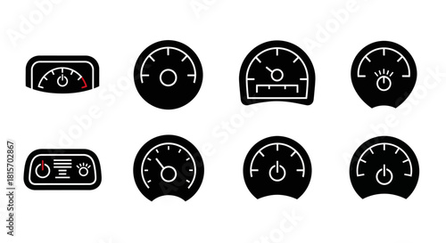 Collection of black dashboard gauges and indicators for vehicle speed and performance