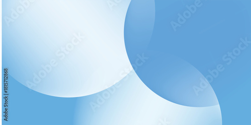 Abstract blue background with smooth, overlapping circular shapes. The background is light blue with a gradient, creating a soft texture. Gradient aesthetic. Blue background with copy space.