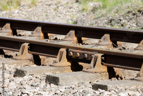 Metal railway track rails and concrete sleepers