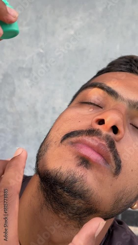 Boy Applying Eye Drops Close-Up Vertical 4K Footage