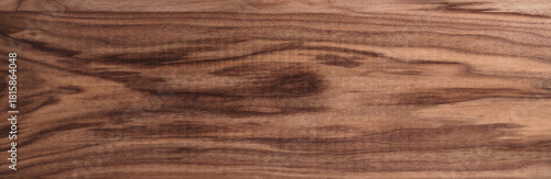Texture of sanded raw black walnut wood without finish