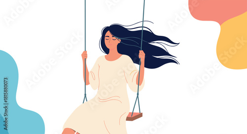 A serene young woman with long dark hair flowing in the wind enjoys a moment of freedom and peace on a swing.