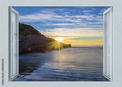 Open window to a seascape at dawn