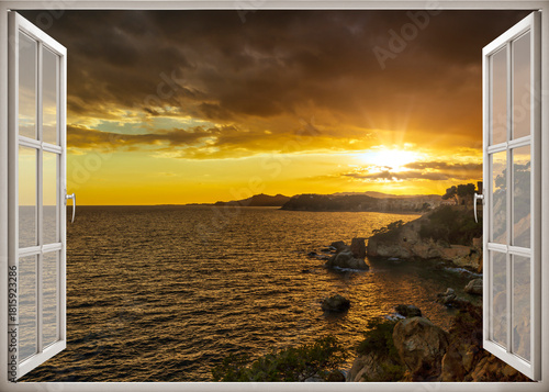 Open window to a seascape at dawn