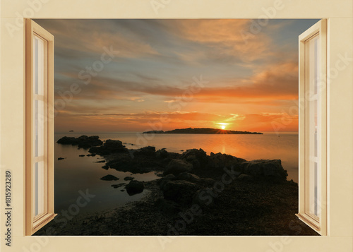 Open window to a seascape at dawn