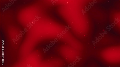 Blurred red background with small bright dots scattered
