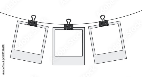 A simple black and white line art illustration of three blank instant photo frames hanging from a string with binder clips.